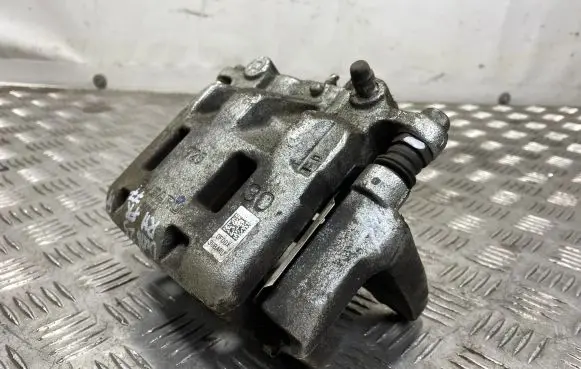 Subaru Outback (BT) Front brake caliper