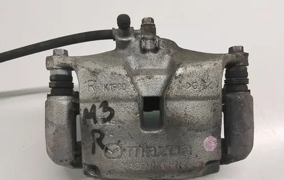 Mazda 3 II Front brake caliper B4Y03398ZB