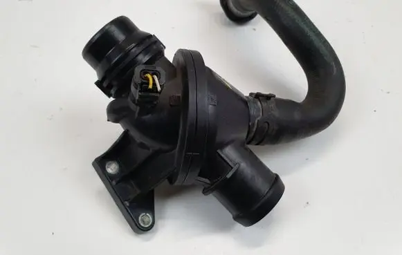 Thermostat/thermostat housing