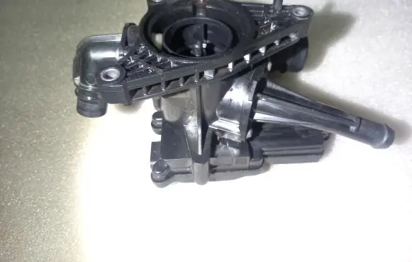 Thermostat/thermostat housing