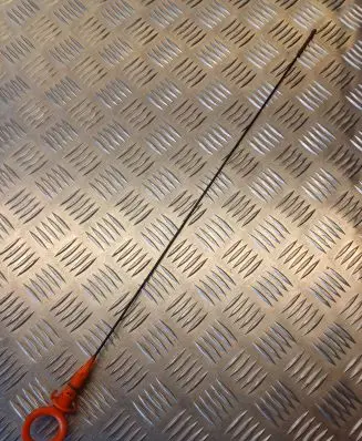 Oil level dip stick