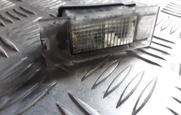 Renault Megane II Number plate light 7700796163