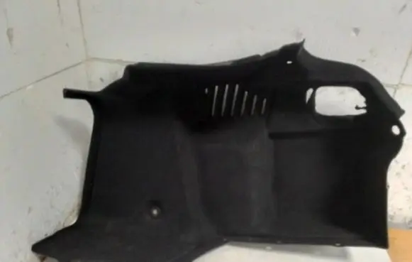 Trunk/boot side trim panel