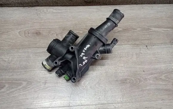 Thermostat/thermostat housing