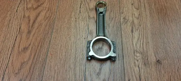 Renault Laguna III Connecting rod/conrod 7701475074