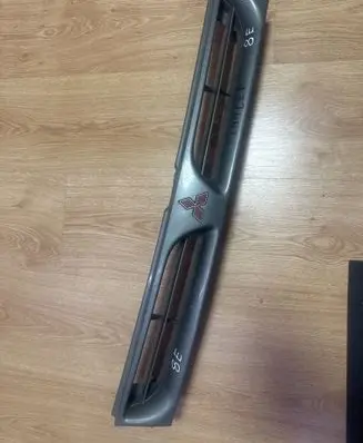 Mitsubishi Lancer Front bumper upper radiator grill MB696771