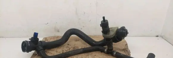 Volkswagen PASSAT B5 Engine coolant pipe/hose