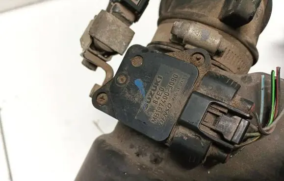 Suzuki Swift I Mass air flow meter MB1974003090 84E0