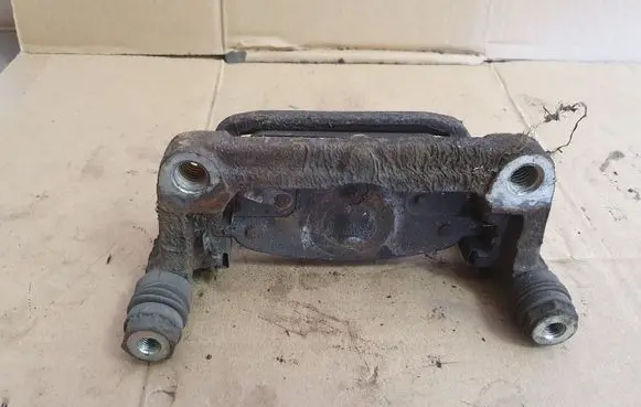 Opel Astra J Brake caliper pad carrier rear 