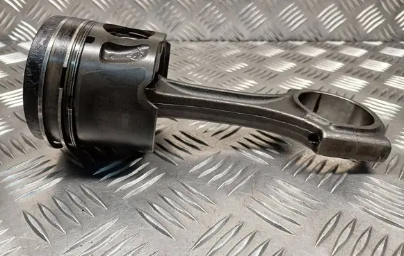 Piston with connecting rod