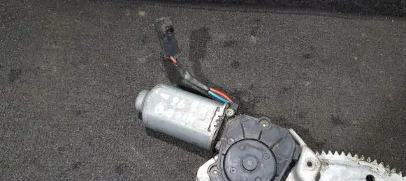 Nissan Micra Front door window regulator motor