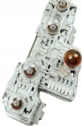 Tail light bulb cover holder