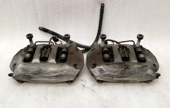 Porsche Cayenne (92A) Rear brake caliper 7P0615424 7P0615423