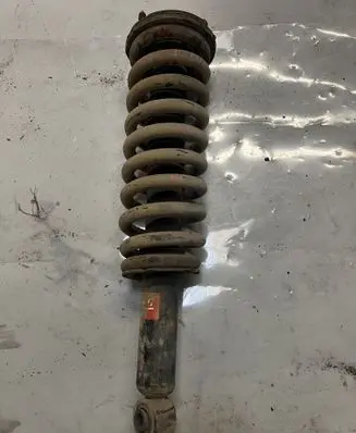 Front shock absorber with coil spring