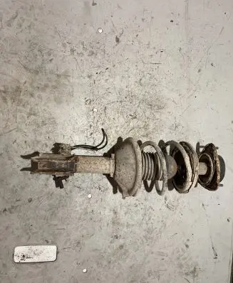 Subaru Legacy Front shock absorber with coil spring