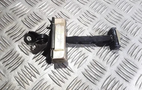 Front door check strap stopper