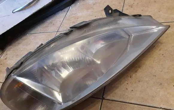 Renault Megane I Headlight/headlamp 7701047180 67743625