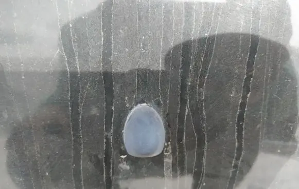 Windshield washer spray nozzle