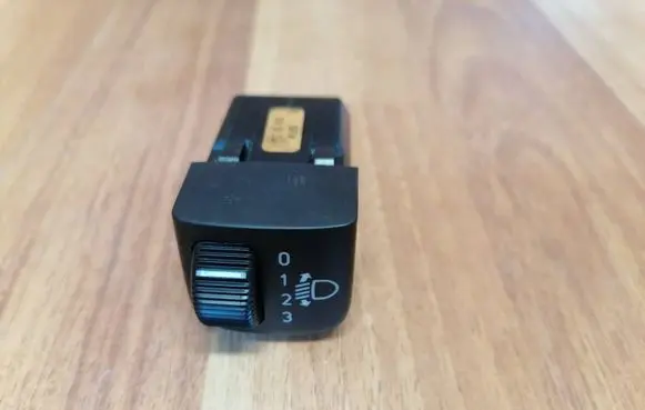 Saab 9-5 Headlight level height control switch 12766836 W549K