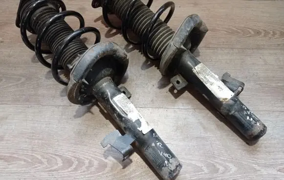Volvo V40 Front shock absorber with coil spring 2597139