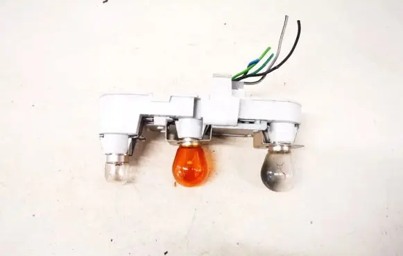 Volvo S40, V40 Tail light bulb cover holder
