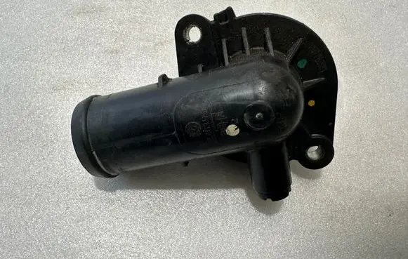 Thermostat/thermostat housing