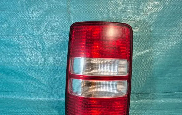 Volkswagen Caddy Rear/tail lights 2K0945111A