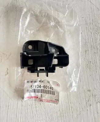 Toyota Land Cruiser (J150) Headlight/headlamp mounting bracket 52134-60140
