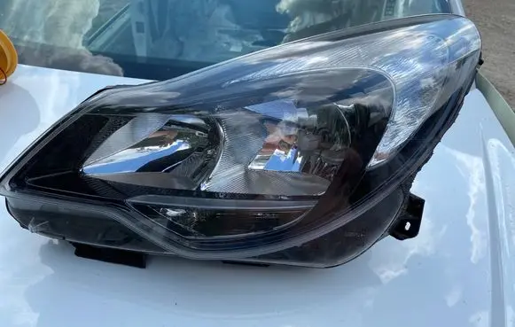 Opel Corsa D Headlight/headlamp 13446801 90054714 900547140M66