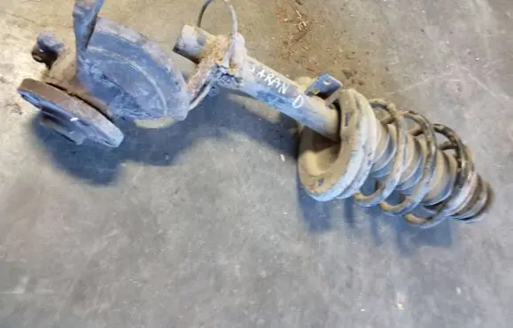 Front shock absorber with coil spring