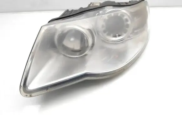 Volkswagen Touareg I Headlight/headlamp 7L6941031A 1LL247032-03