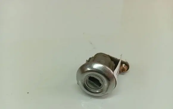 Mazda 121 Front door lock (next to the handle)