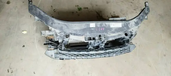 Radiator support slam panel