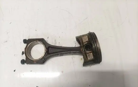 Piston with connecting rod