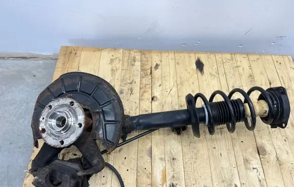 Front shock absorber with coil spring
