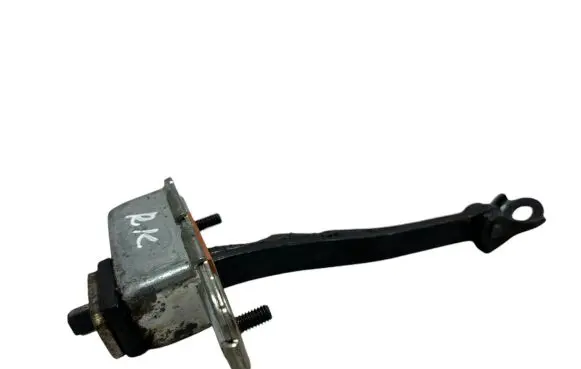 Front door check strap stopper