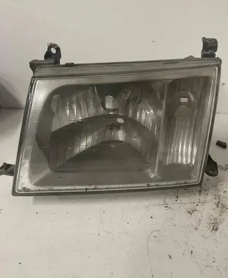 Toyota Land Cruiser (J100) Headlight/headlamp UPM600F20