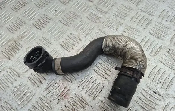 Volkswagen Golf VII Engine coolant pipe/hose 5Q0122073AL