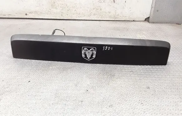 Trunk door license plate light bar