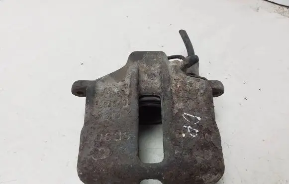 Volkswagen PASSAT B5 Front brake caliper
