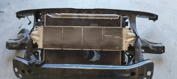 Radiator support slam panel