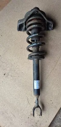 Front shock absorber with coil spring