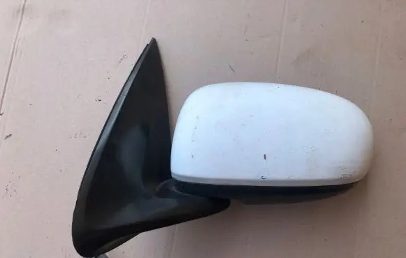 Nissan Almera N16 Front door electric wing mirror 