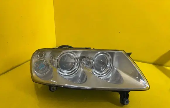 Volkswagen Touareg I Headlight/headlamp 7L6941016