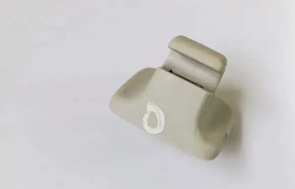 Volkswagen PASSAT B6 Sun visor clip/hook/bracket 1K0857561B