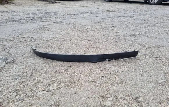 Opel Astra H Front bumper lip 13121999