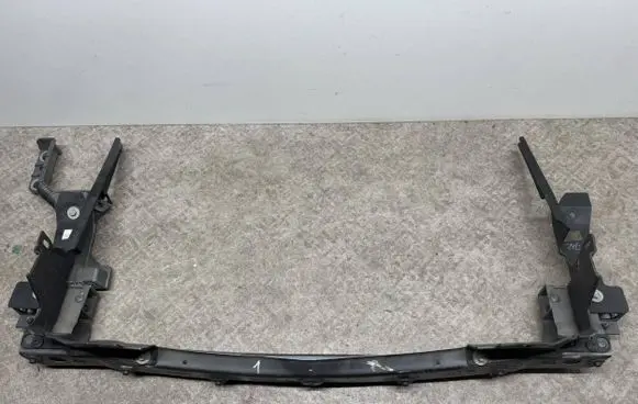 Top upper radiator support slam panel