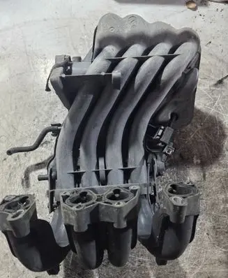 Volkswagen Golf IV Intake manifold 06A133205E