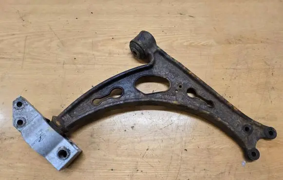 Volkswagen Caddy Front lower control arm/wishbone 100326101B 1990035