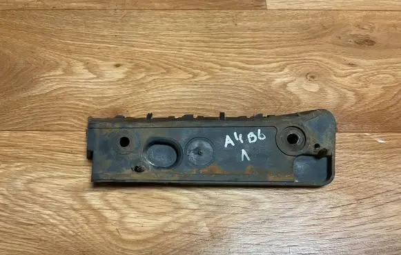 Front bumper mounting bracket
